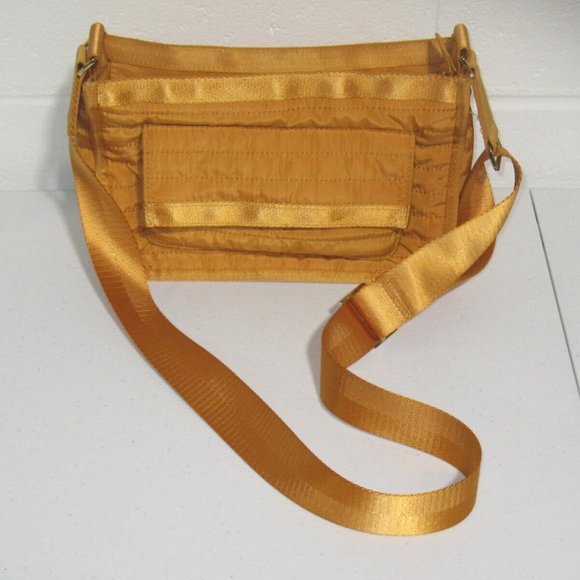 Tommy Bahama Mini Mighty Quilted Travel Puffer Crossbody Bag - Picture 1 of 13